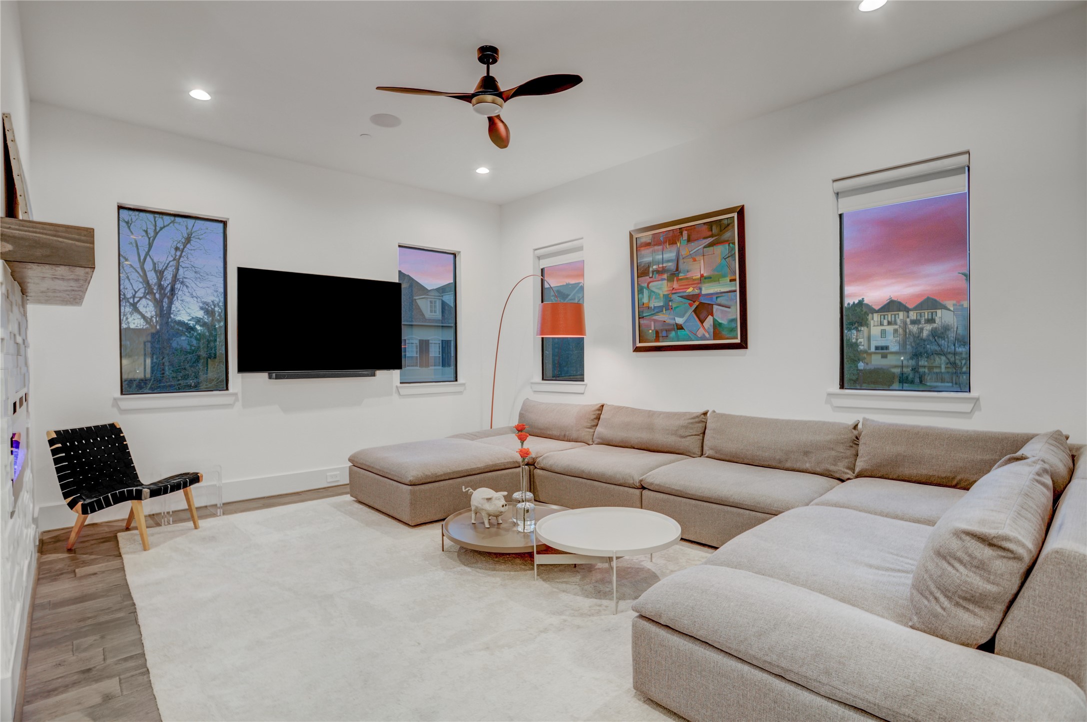 2435 Sheridan Street Houston, TX 77030 - Photo 4 of 25 a living room with furniture workspace and a flat screen tv