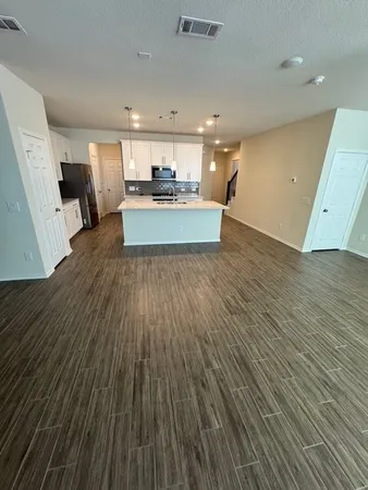 a view of kitchen and electric room