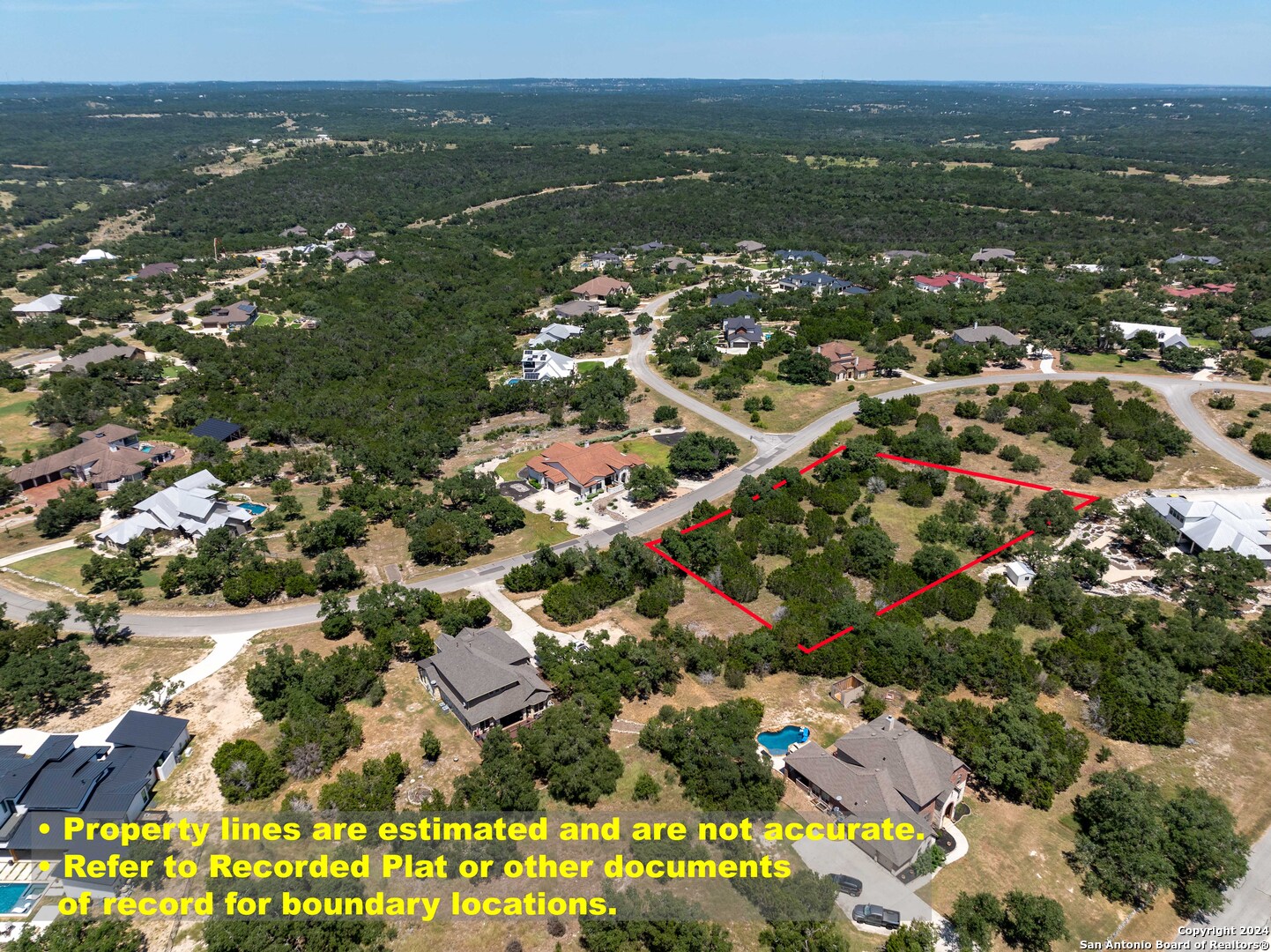 7726 Ramble Ridge San Antonio, TX 78266 - Photo 11 of 14 an aerial view of residential houses with city view