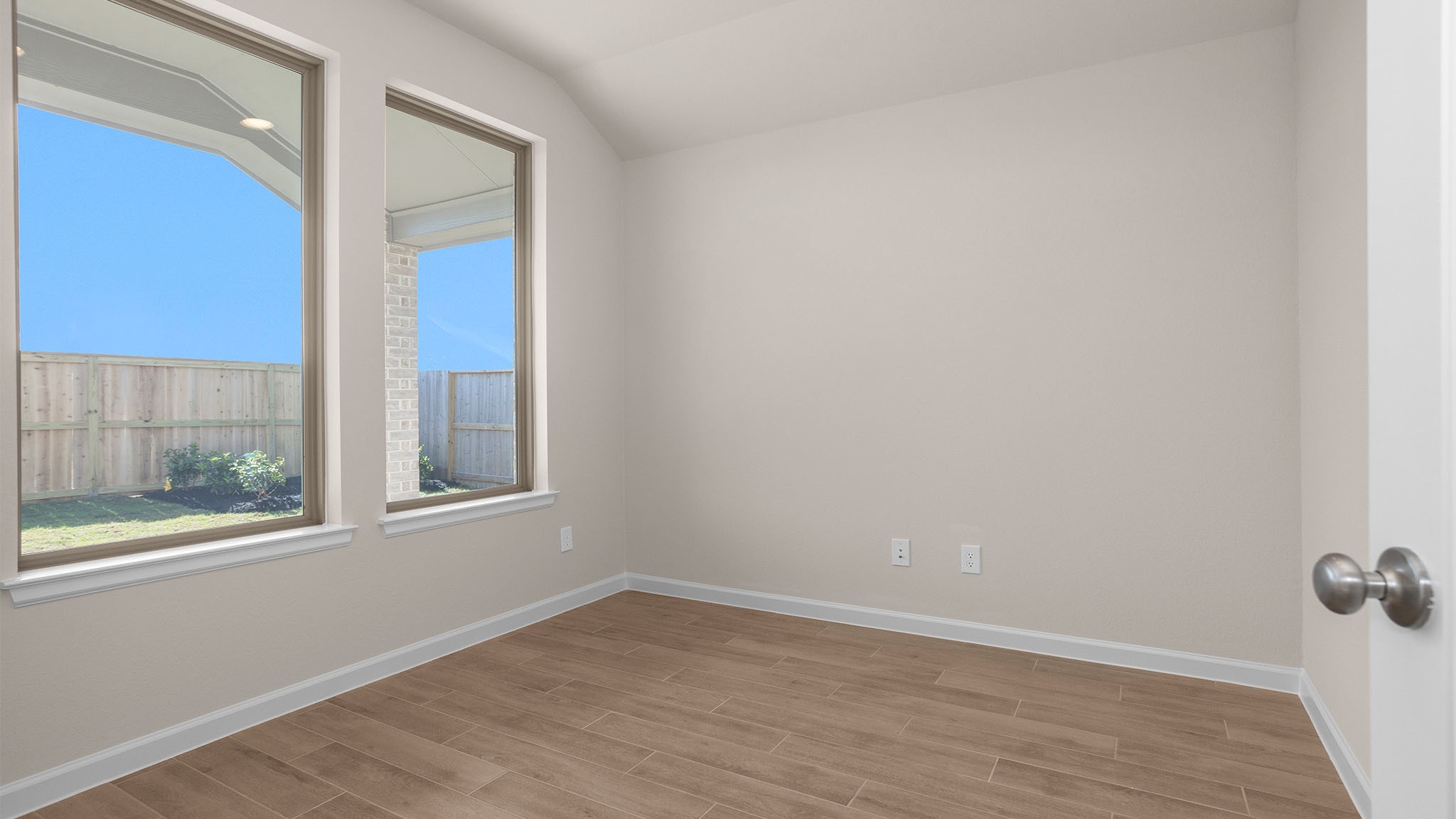 6058 Cottontail Lane Manvel, TX 77578 - Photo 11 of 26 an empty room with a window