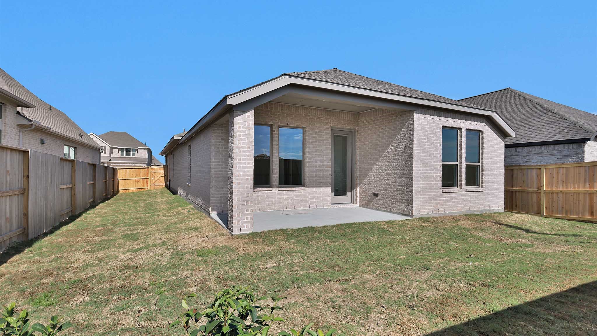 6058 Cottontail Lane Manvel, TX 77578 - Photo 16 of 26 a view of a house with a yard