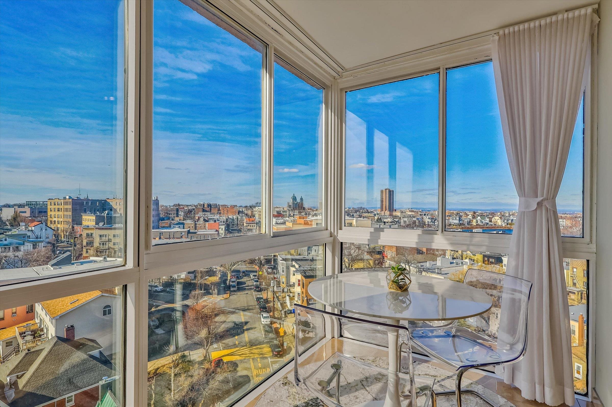 380 Mountain Road, Unit 1015 Union City, NJ 07087 - Photo 11 of 43 a room with furniture and a window