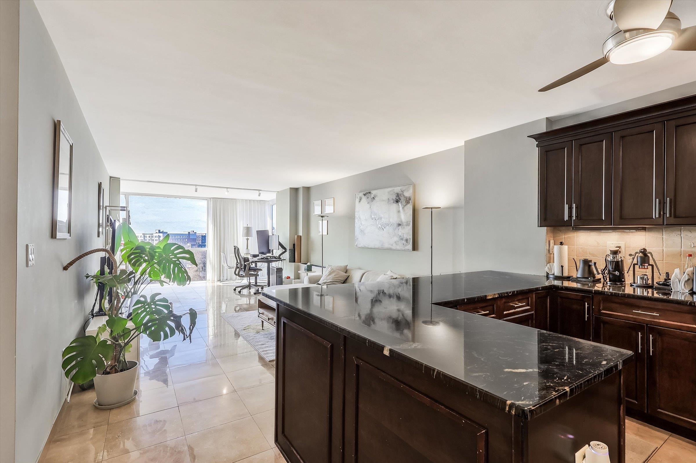 380 Mountain Road, Unit 1015 Union City, NJ 07087 - Photo 2 of 43 a kitchen with a sink stove and cabinets