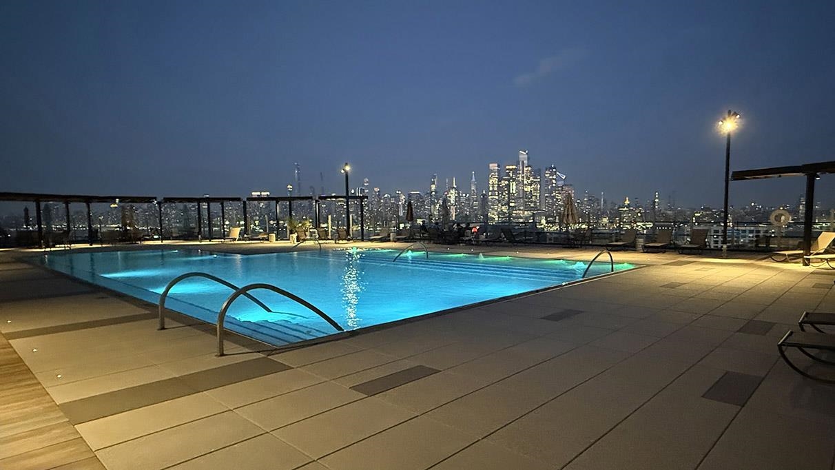 380 Mountain Road, Unit 1015 Union City, NJ 07087 - Photo 36 of 43 a view of a swimming pool and an outdoor space