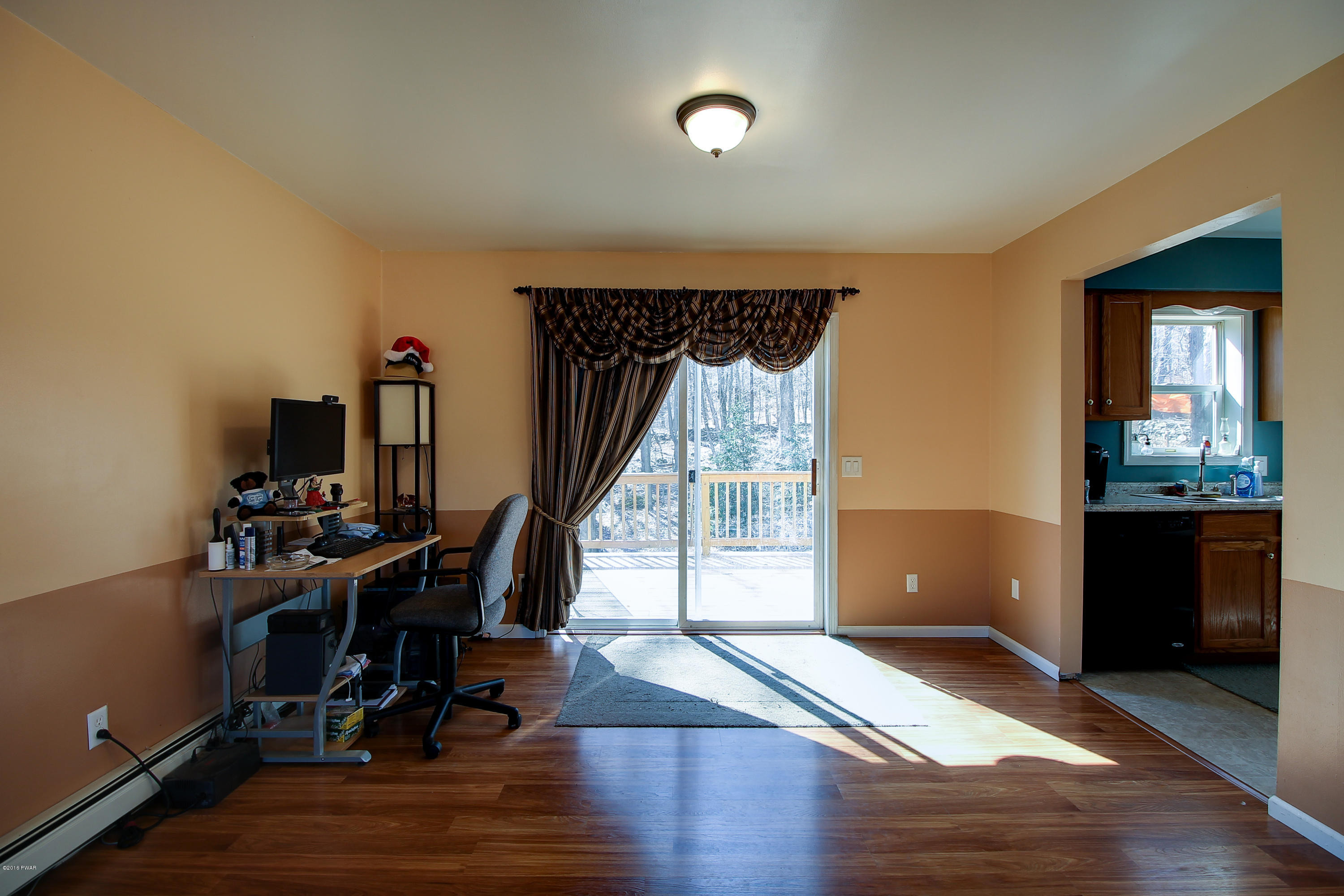 5630 Haas Pond Road Moscow, PA 18444 - Photo 8 of 42 a view of a room with gym equipment