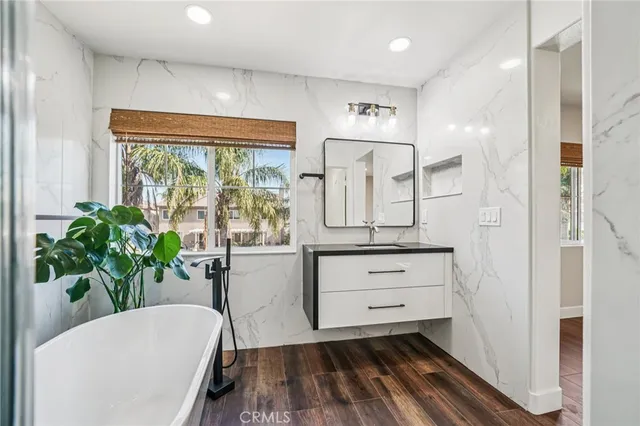 a room with cabinets and wooden floor