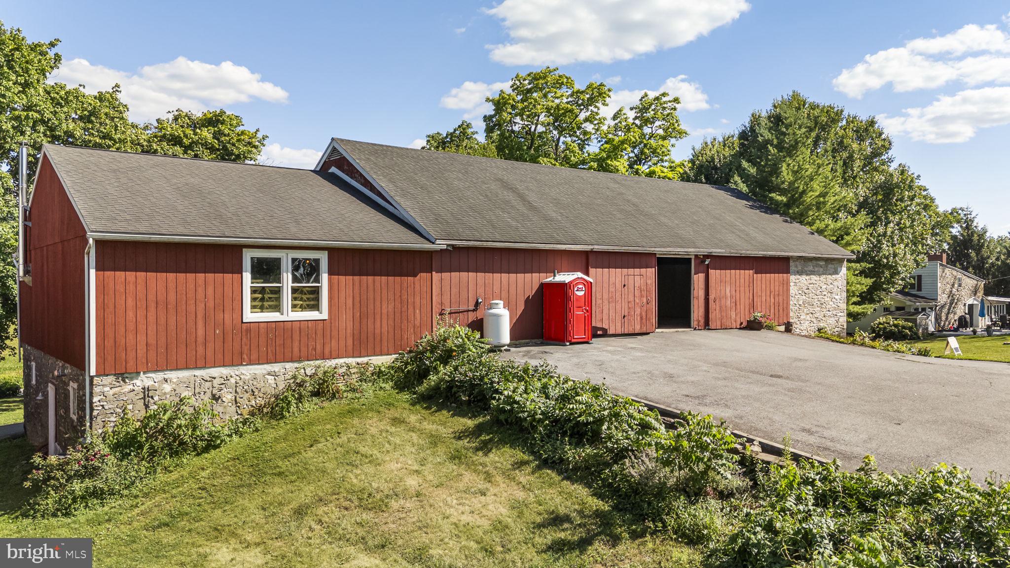 416 Snyder Road Reading, PA 19605 - Photo 56 of 63 Charming red home with scenic backdrop.