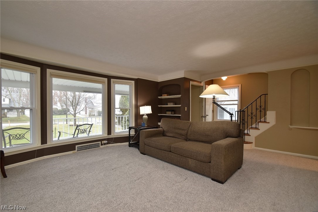 1521 Sheffield Road Cleveland, OH 44121 - Photo 5 of 29 Brand new carpet in this light filled living room!