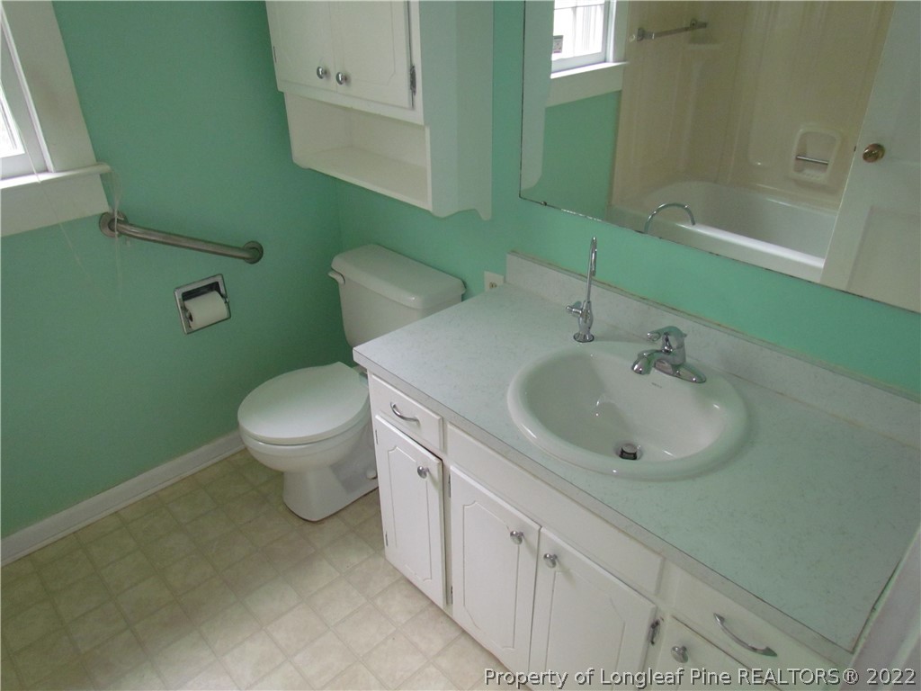 1635 Wade-Stedman Road Stedman, NC 28391 - Photo 11 of 23 a bathroom with a sink toilet and tub