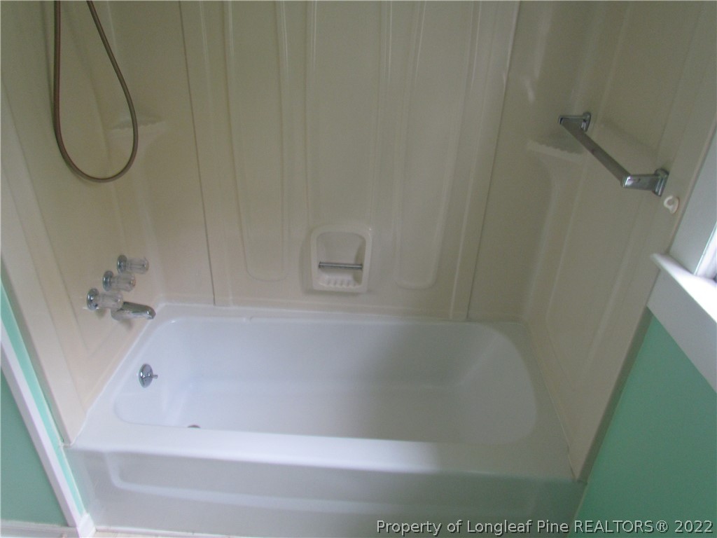 1635 Wade-Stedman Road Stedman, NC 28391 - Photo 12 of 23 a bathroom with a bath tub