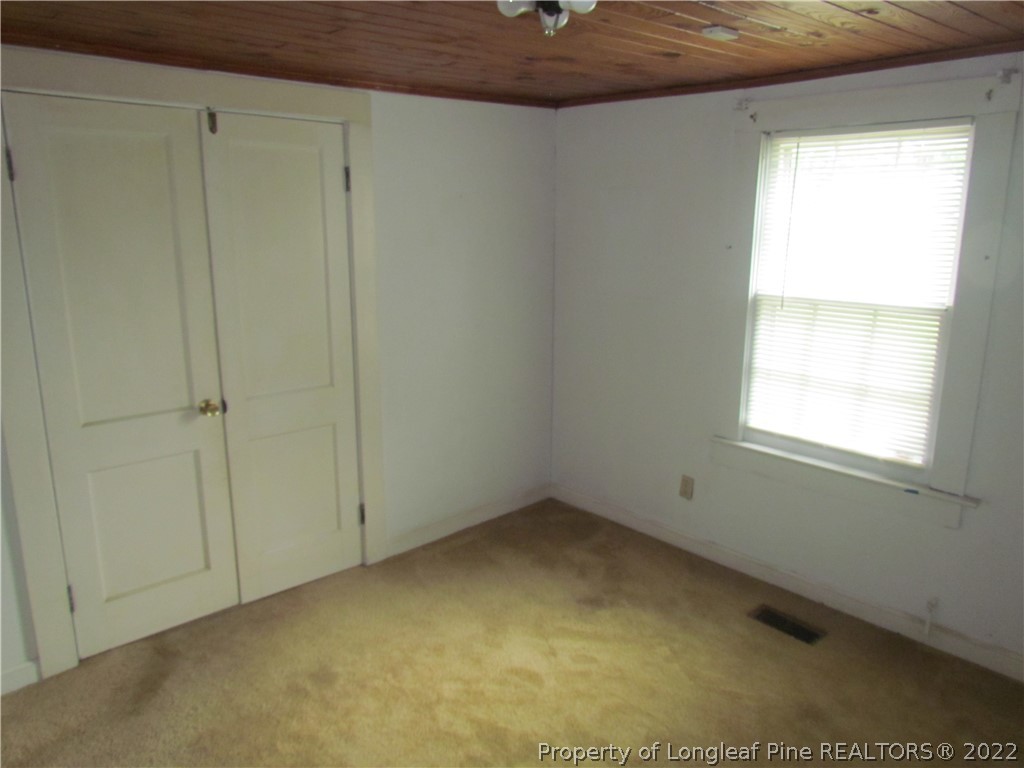 1635 Wade-Stedman Road Stedman, NC 28391 - Photo 16 of 23 a view of an empty room and a window