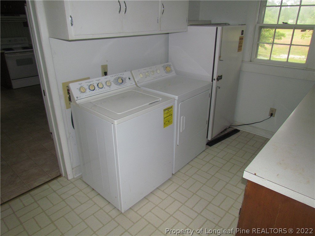 1635 Wade-Stedman Road Stedman, NC 28391 - Photo 19 of 23 a utility room with dryer and washer