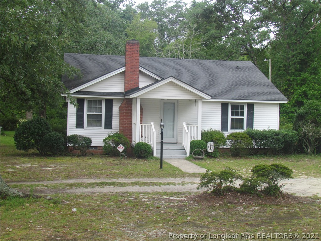 1635 Wade-Stedman Road Stedman, NC 28391 - Photo 2 of 23 a front view of a house with garden