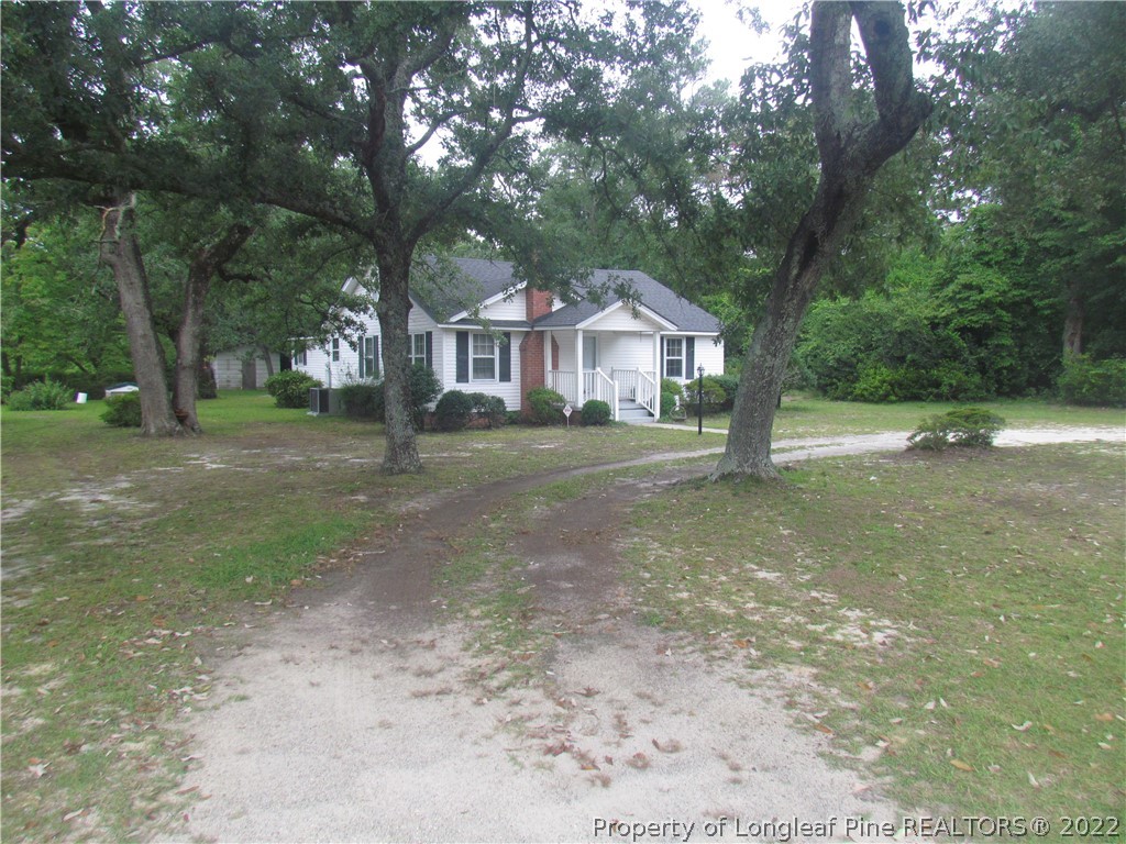 1635 Wade-Stedman Road Stedman, NC 28391 - Photo 4 of 23 a view of a house with a yard