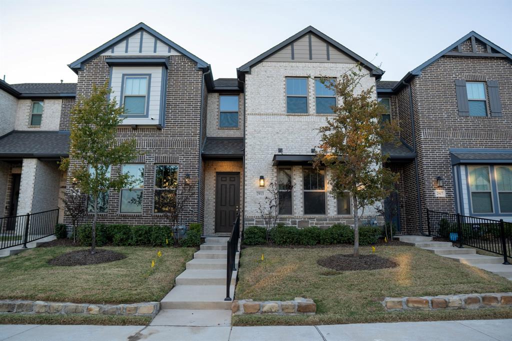 2913 Alto Drive Sachse, TX 75048 - Photo 2 of 5 a front view of a house with garden
