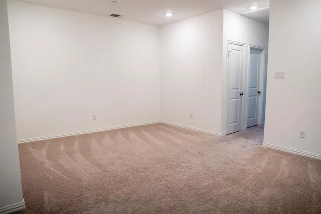 an empty room with a workbench