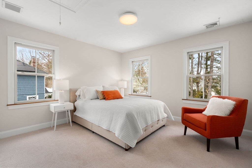12 Vaille Avenue Lexington, MA 02421 - Photo 16 of 33 a spacious bedroom with a bed and window