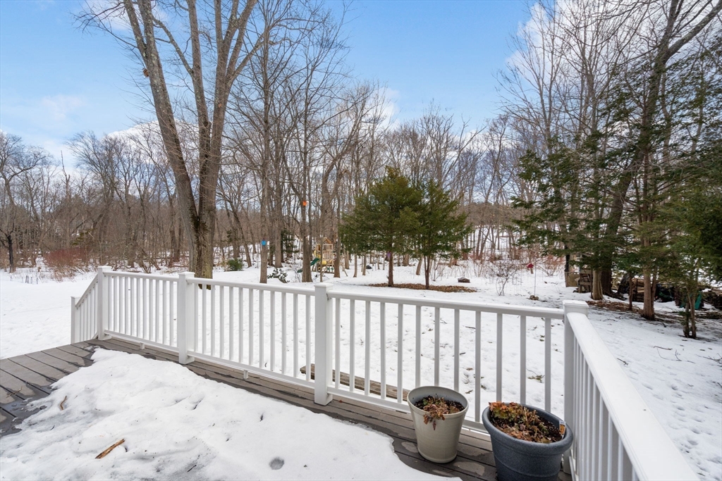 12 Vaille Avenue Lexington, MA 02421 - Photo 24 of 33 a view of a house with a wooden fence