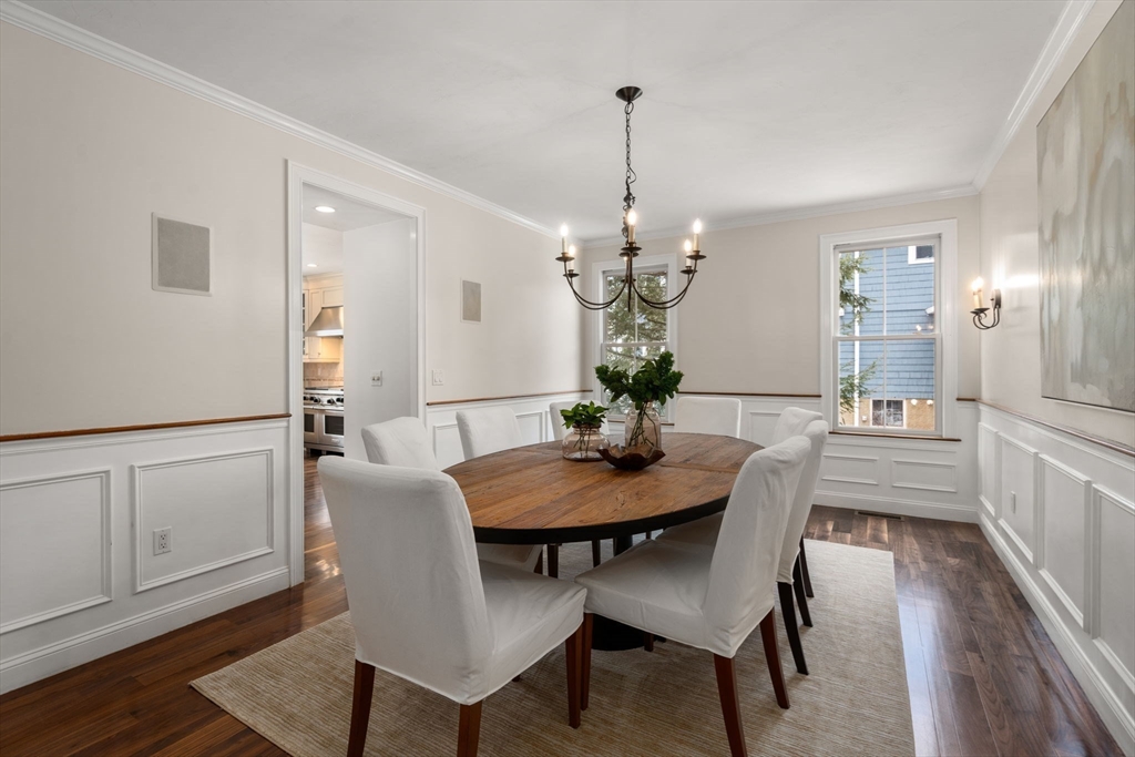 12 Vaille Avenue Lexington, MA 02421 - Photo 8 of 33 a view of a dining room with furniture and wooden floor