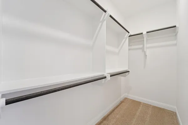 a view of a room with racks on the wall