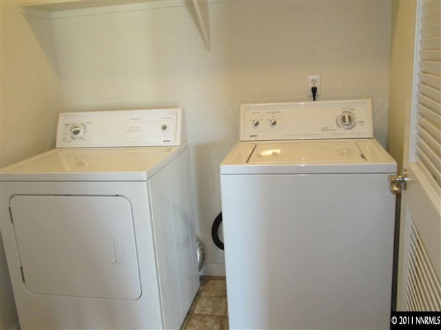 9050 Double R Boulevard Reno, NV 89511 - Photo 12 of 13 a utility room with dryer and washer