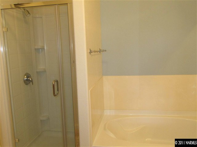 9050 Double R Boulevard Reno, NV 89511 - Photo 9 of 13 a bathroom with a shower