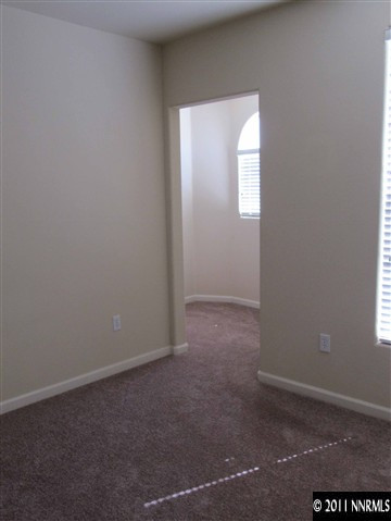 9050 Double R Boulevard Reno, NV 89511 - Photo 10 of 13 an empty room that has a window