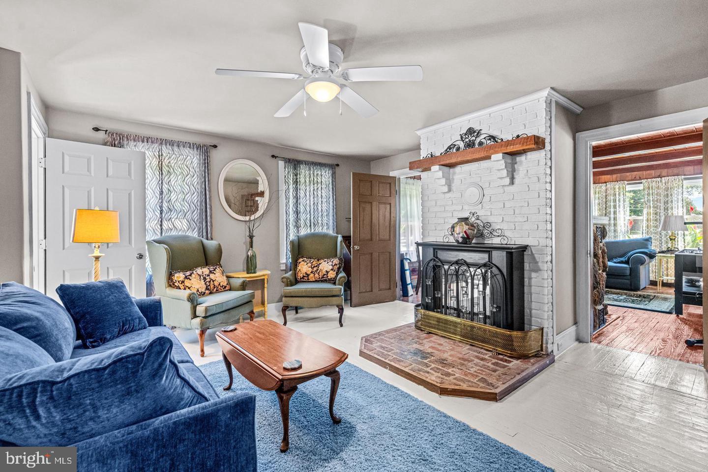 668 Crawford Road Cape May, NJ 08204 - Photo 12 of 66 a living room with furniture and a rug