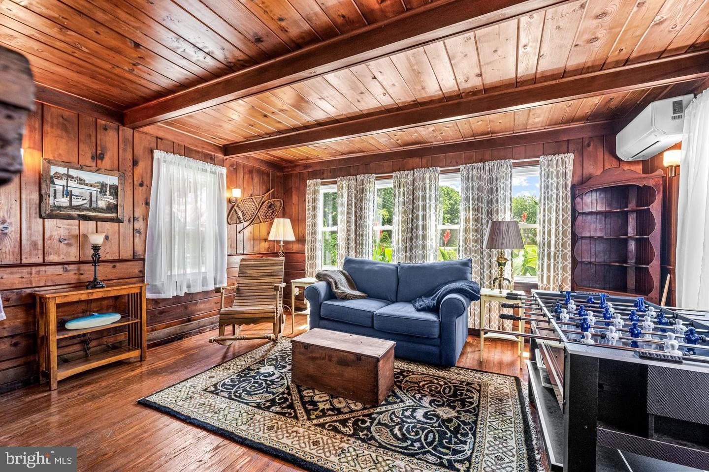 668 Crawford Road Cape May, NJ 08204 - Photo 15 of 66 a living room with furniture and wooden floor