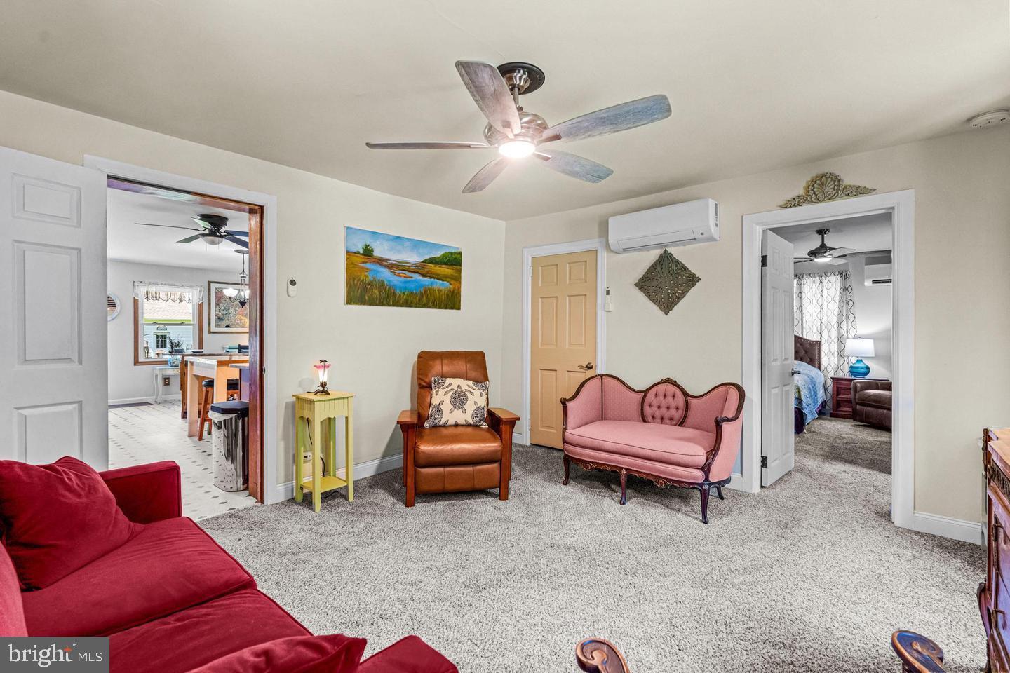 668 Crawford Road Cape May, NJ 08204 - Photo 32 of 66 a living room with furniture and a ceiling fan