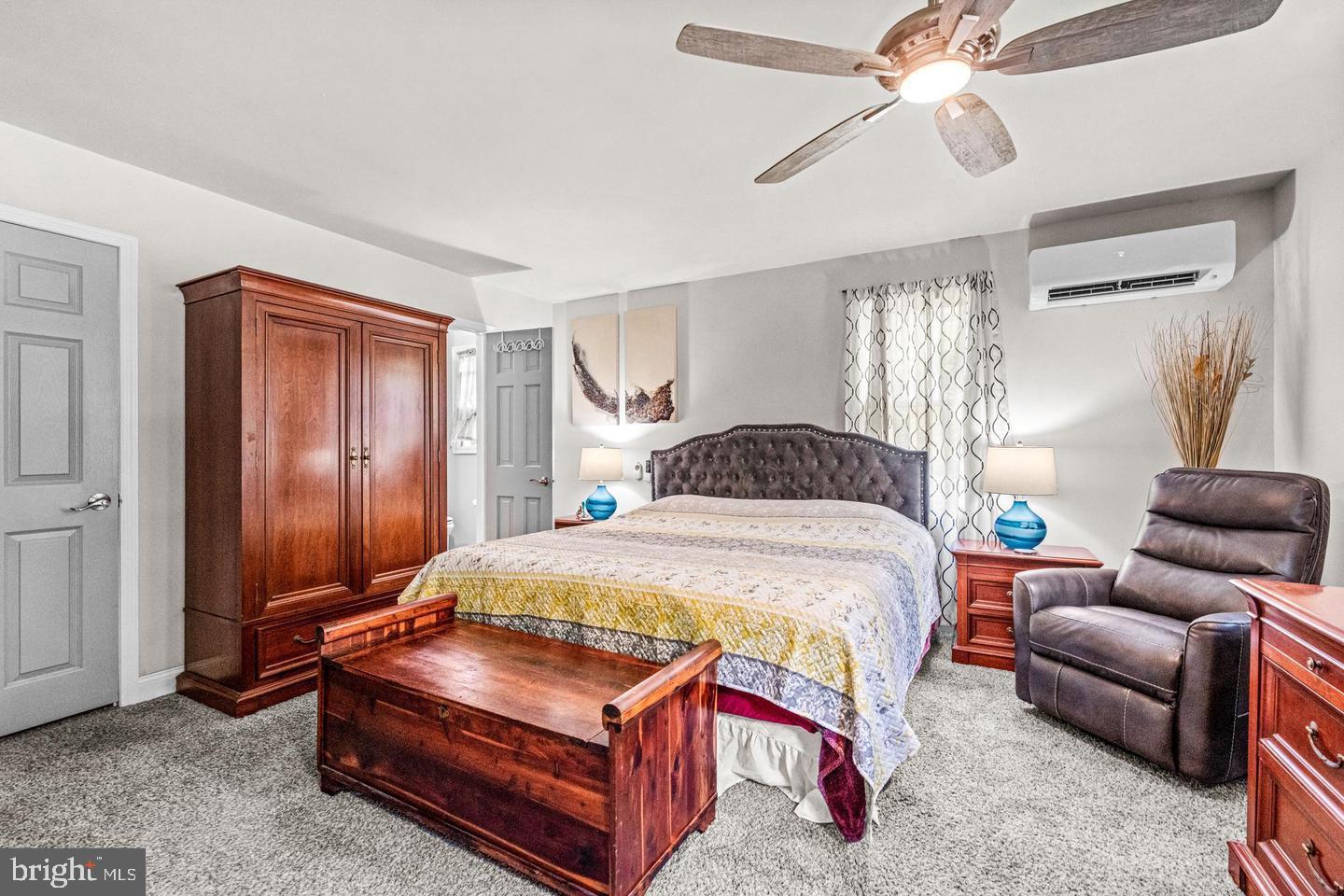 668 Crawford Road Cape May, NJ 08204 - Photo 34 of 66 a bedroom with a bed couch and window