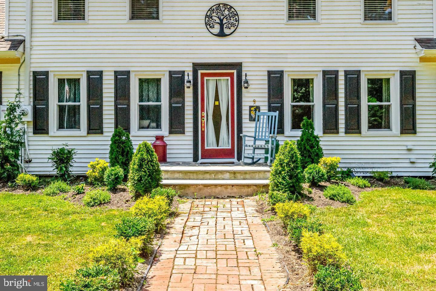 668 Crawford Road Cape May, NJ 08204 - Photo 4 of 66 a front view of a house having yard