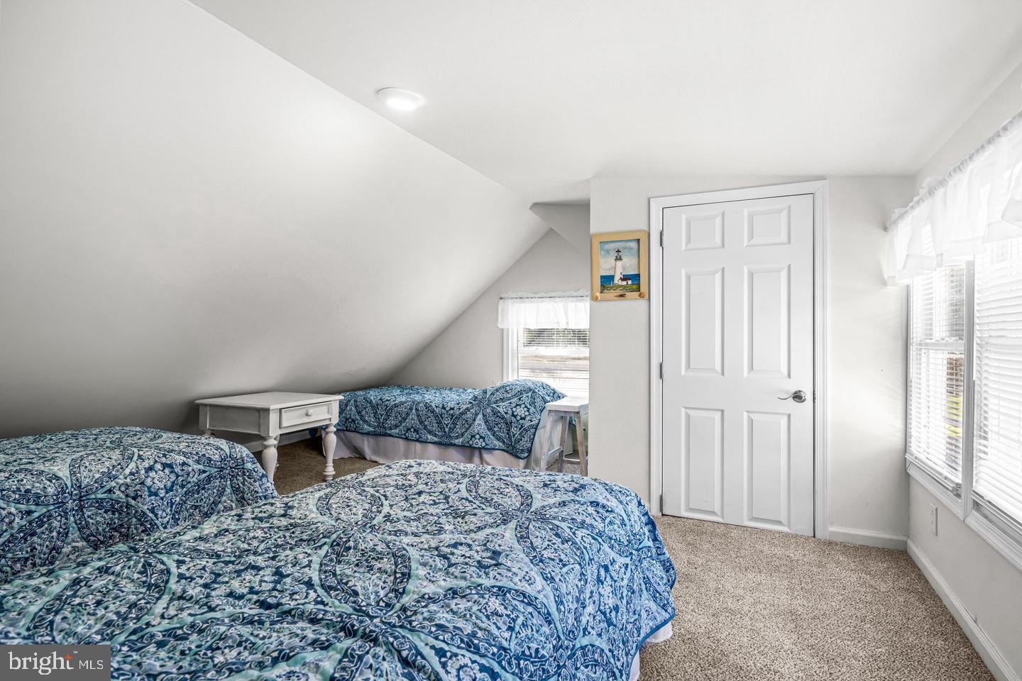 668 Crawford Road Cape May, NJ 08204 - Photo 45 of 66 a bedroom with a bed and a window