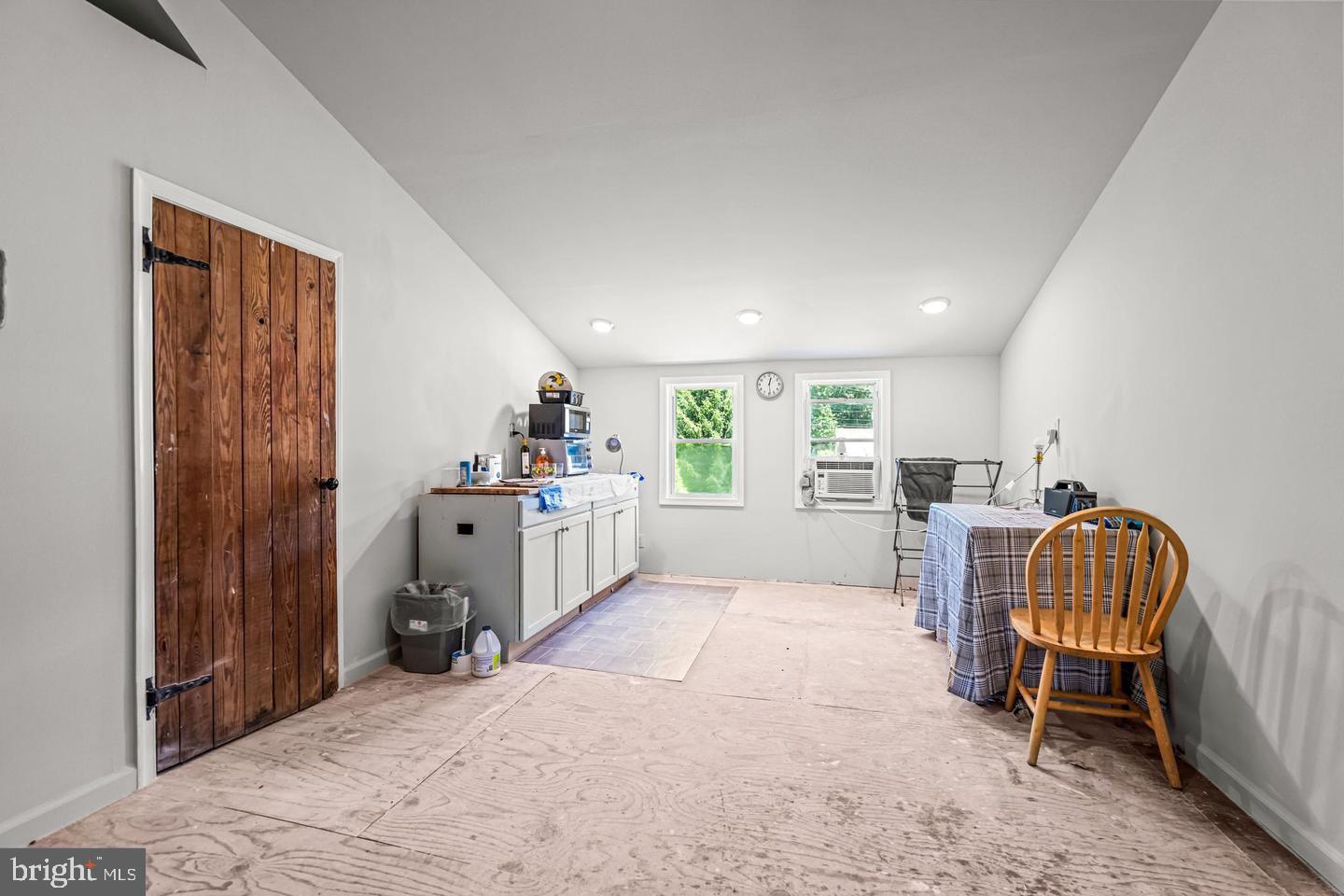 668 Crawford Road Cape May, NJ 08204 - Photo 51 of 66 a living room with furniture and a chair