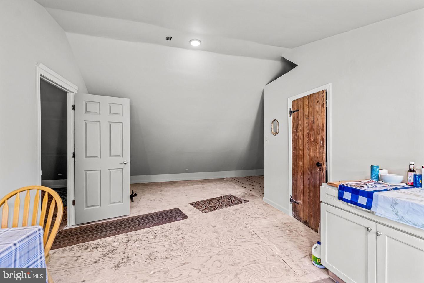 668 Crawford Road Cape May, NJ 08204 - Photo 52 of 66 a bedroom with a bed and a dresser