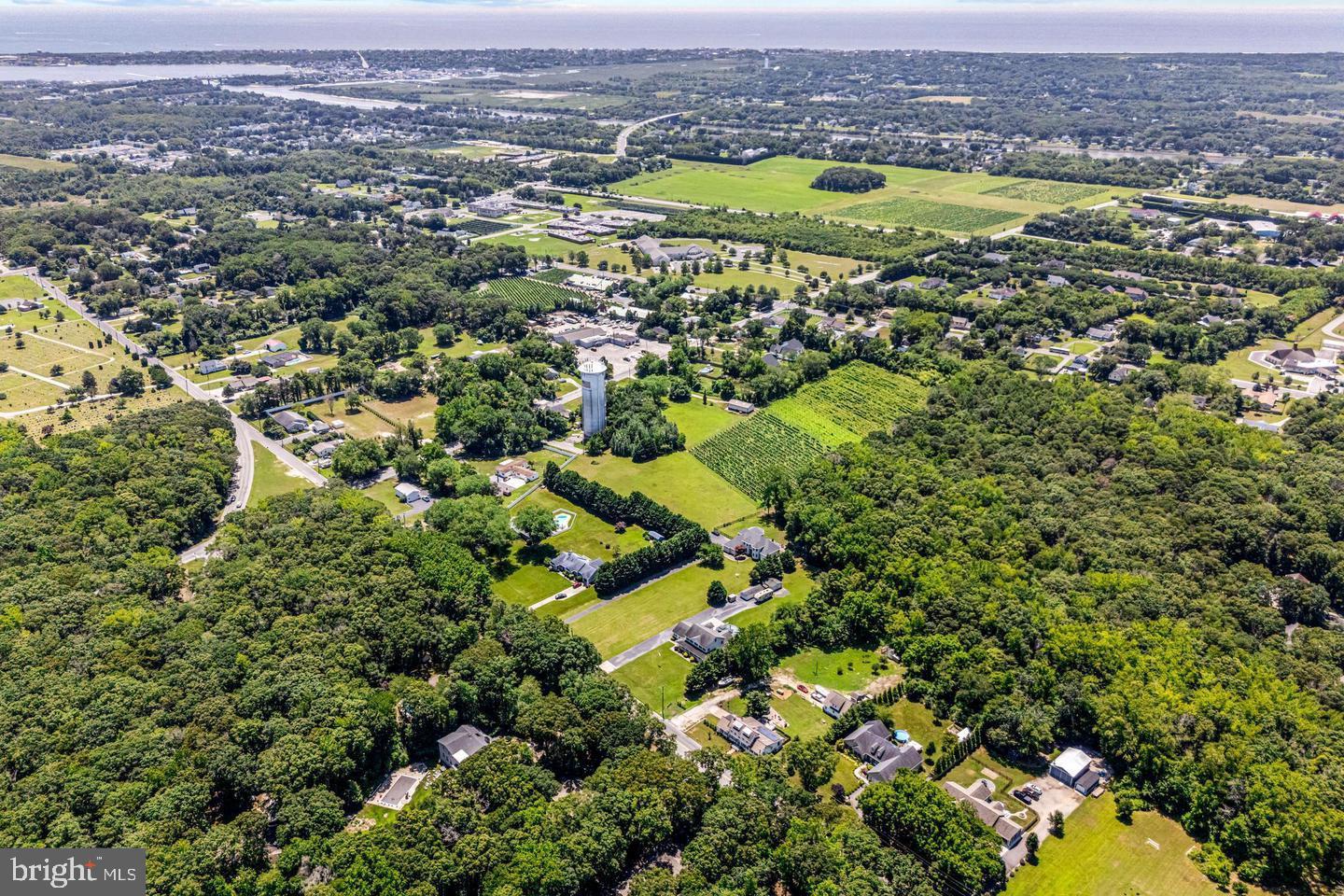 668 Crawford Road Cape May, NJ 08204 - Photo 61 of 66 an aerial view of residential houses with outdoor space and swimming pool
