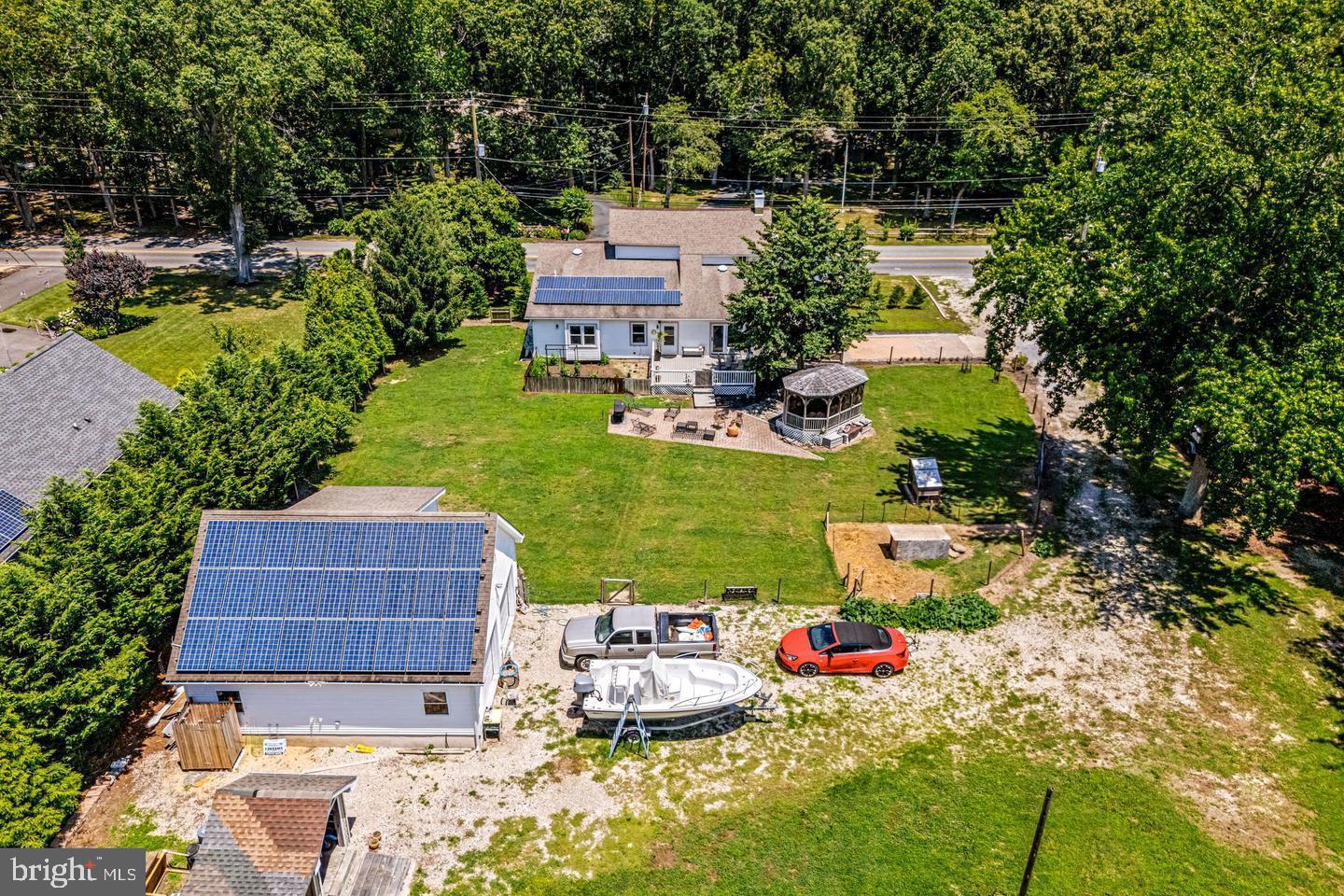668 Crawford Road Cape May, NJ 08204 - Photo 62 of 66 an aerial view of a house with yard swimming pool and outdoor seating
