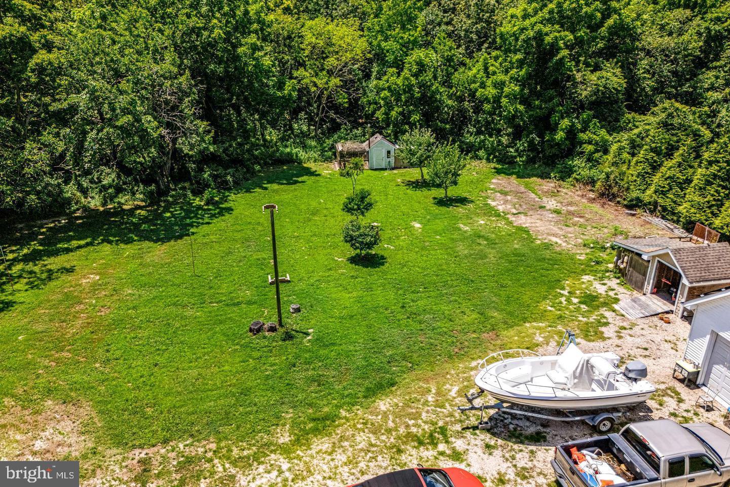 668 Crawford Road Cape May, NJ 08204 - Photo 65 of 66 a backyard of a house with yard and green space