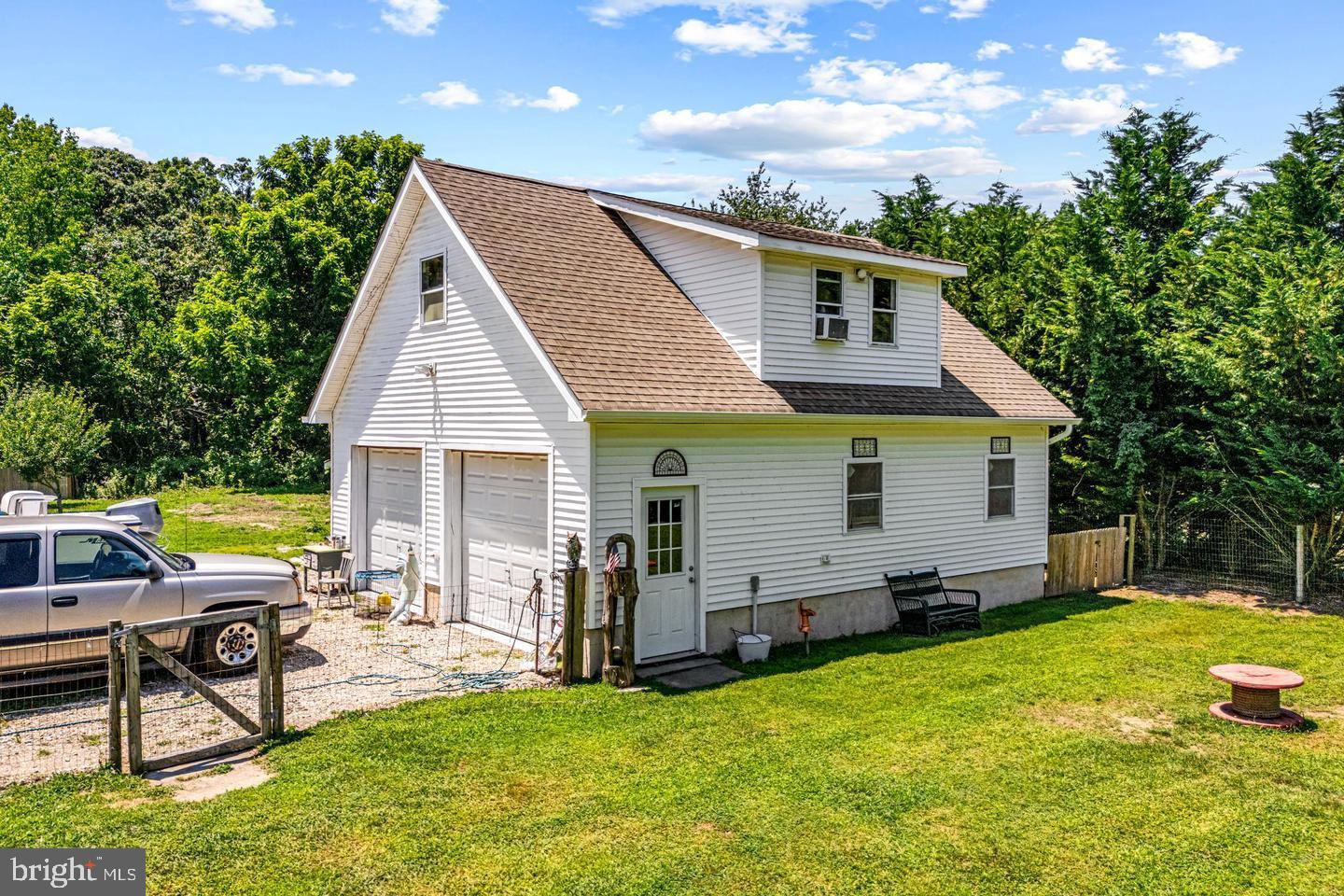 668 Crawford Road Cape May, NJ 08204 - Photo 8 of 66 a view of a house with backyard porch and sitting area