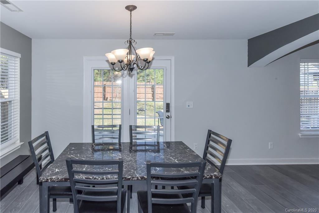 717 Jones Branch Road Fort Mill, SC 29715 - Photo 11 of 31 a view of a dining room with furniture window and outside view