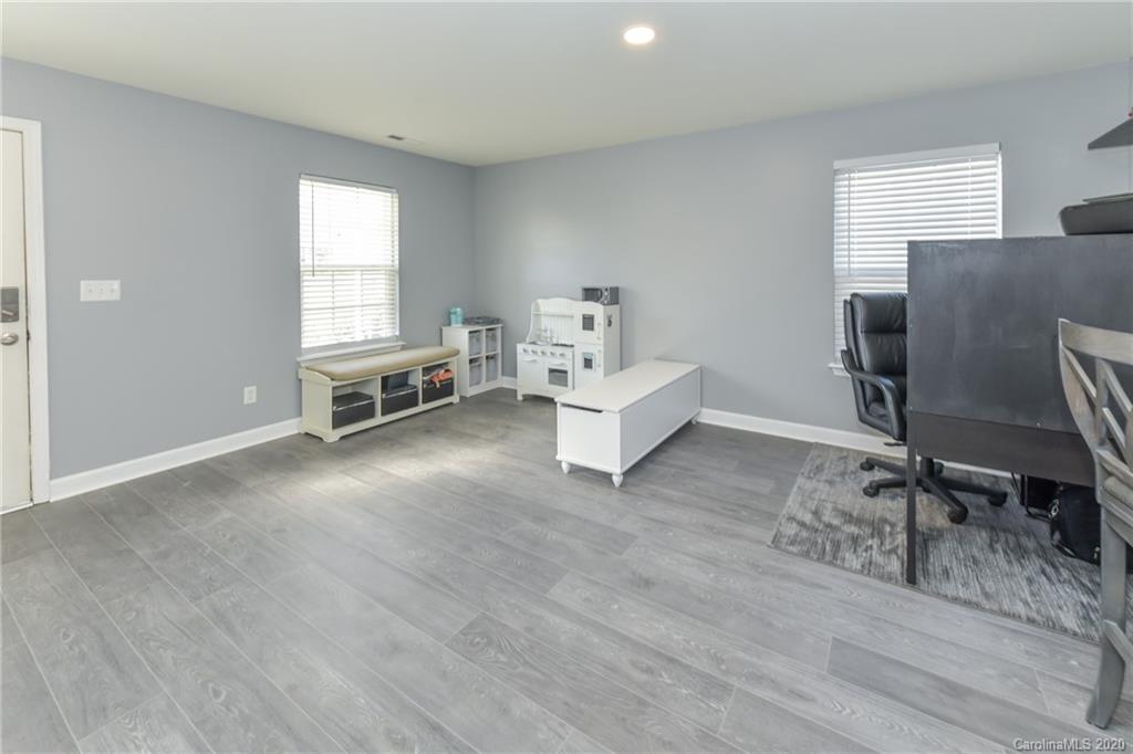 717 Jones Branch Road Fort Mill, SC 29715 - Photo 14 of 31 a living room with furniture and a window