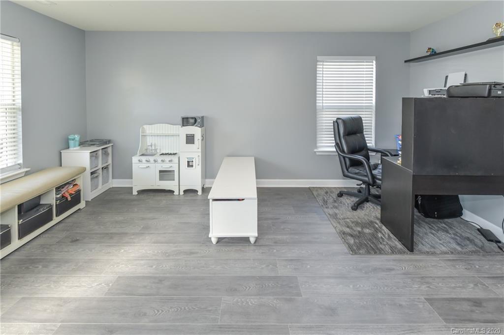 717 Jones Branch Road Fort Mill, SC 29715 - Photo 15 of 31 a view of a workspace with furniture and a window