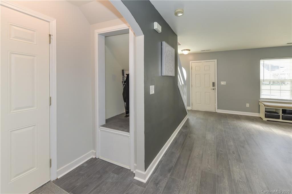 717 Jones Branch Road Fort Mill, SC 29715 - Photo 18 of 31 a view of a hallway with wooden floor and closet