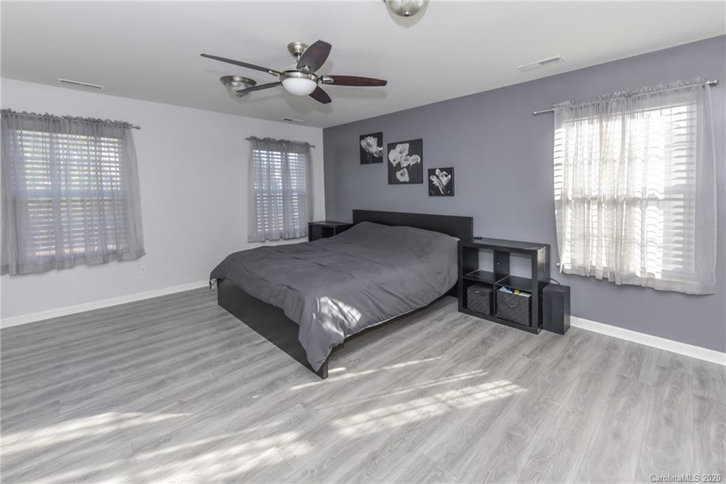 717 Jones Branch Road Fort Mill, SC 29715 - Photo 21 of 31 a bedroom with a bed and window