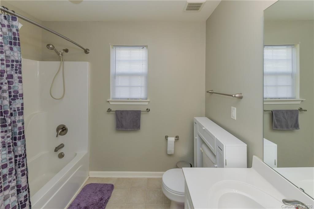 717 Jones Branch Road Fort Mill, SC 29715 - Photo 28 of 31 a bathroom with a toilet and shower