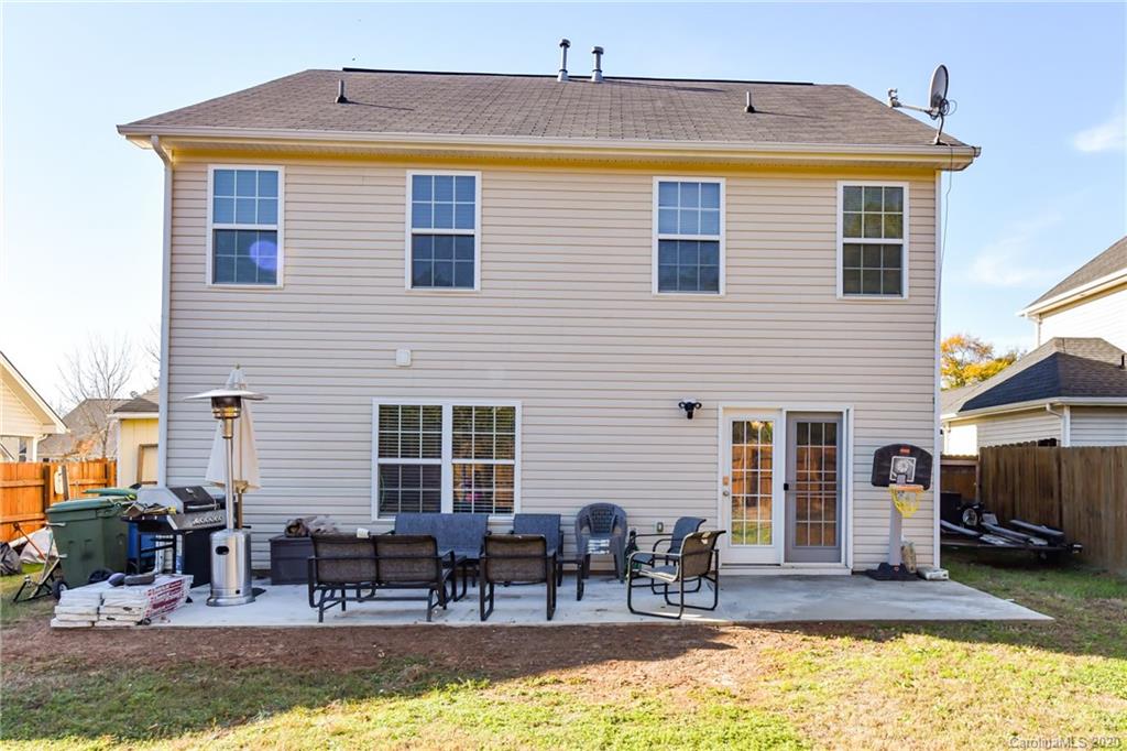 717 Jones Branch Road Fort Mill, SC 29715 - Photo 29 of 31 a view of a house with swimming pool and sitting area