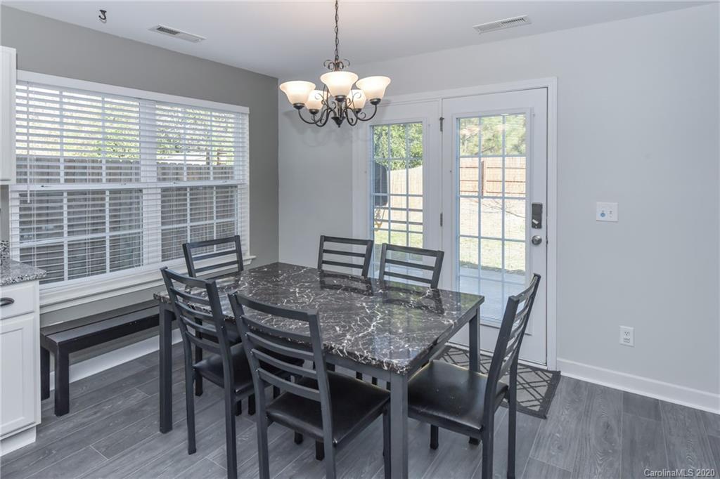 717 Jones Branch Road Fort Mill, SC 29715 - Photo 10 of 31 a view of a dining room with furniture and window