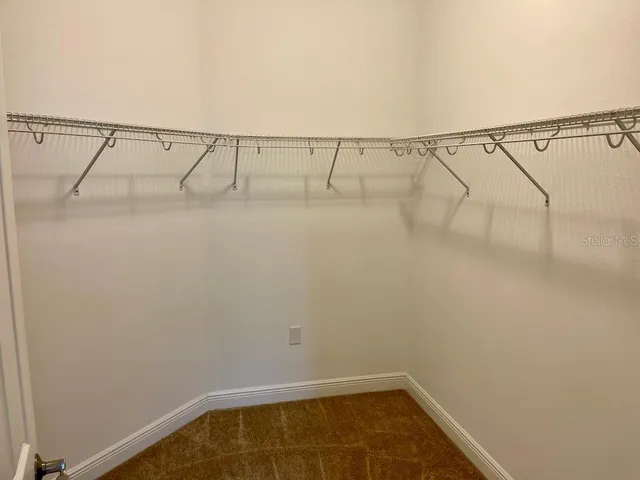 a view of small space with racks on the wall