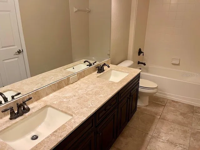 a bathroom with a bath tub