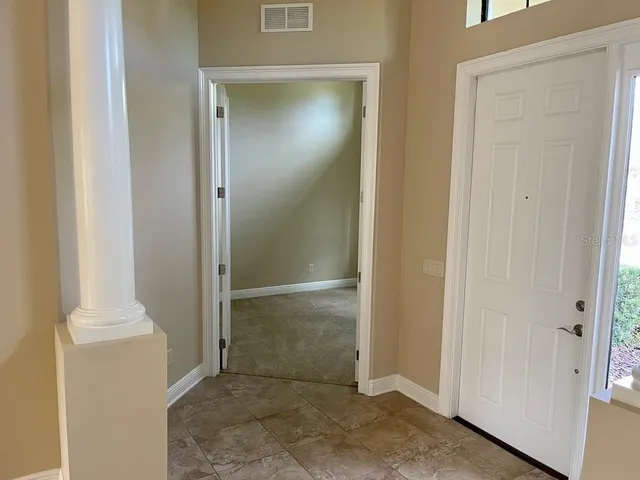 an empty room with a door
